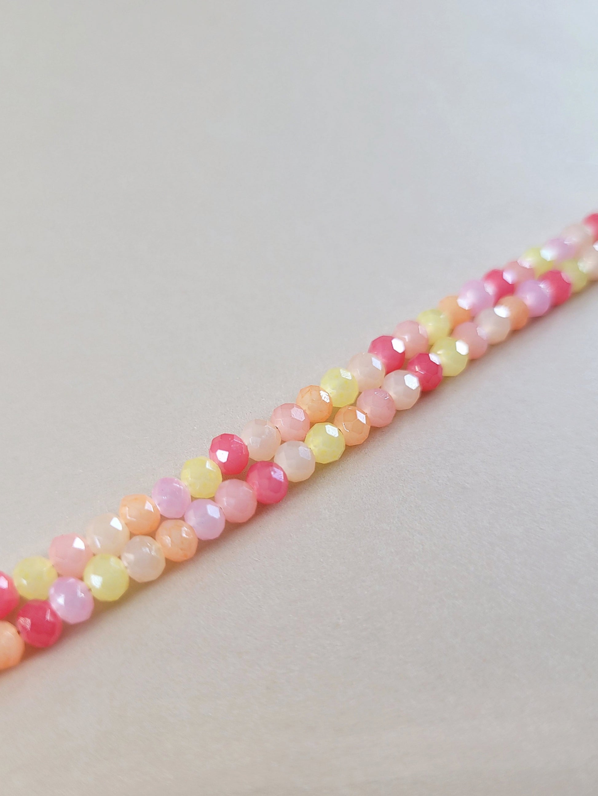 Rondelli lasihelmet pinkin sävyissä