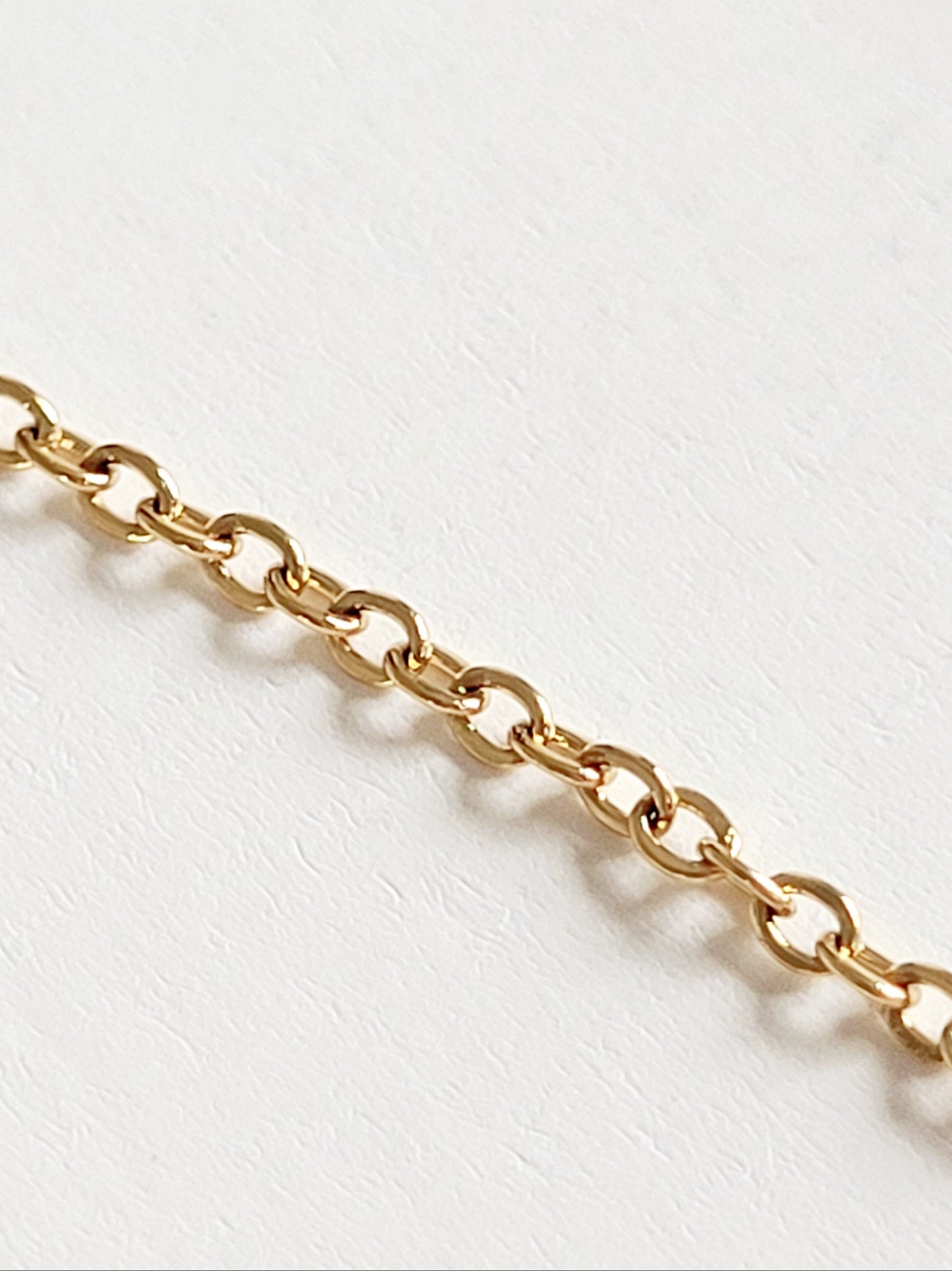 Kultainen teräsketju korutarvike